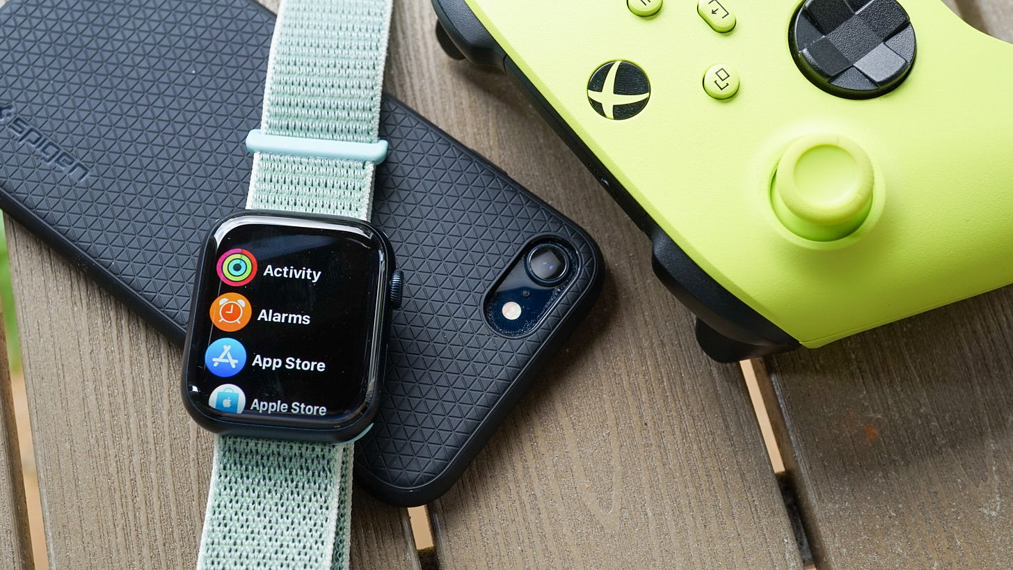 Photo of iPhone, Apple Watch, and Xbox controller