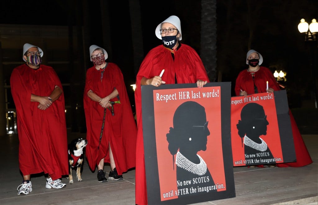 Women Wear 'Handmaid's Tale' Costumes To Protest Trump's SCOTUS Plans