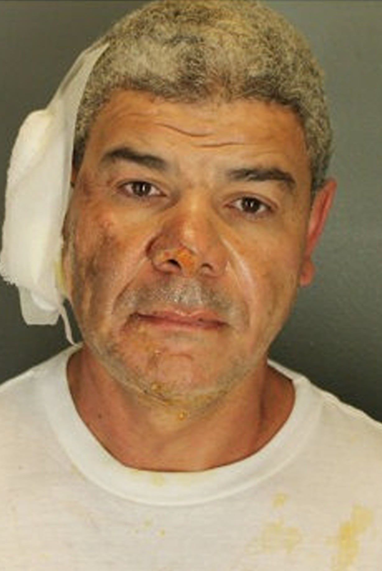 Booking photo released by Boulder Police of 45-year-old Mohamed Sabry Soliman after his arrest in a terrorist firebombing. Booking photo released by Boulder Police of 45-year-old Mohamed Sabry Soliman after his arrest in a terrorist firebombing.