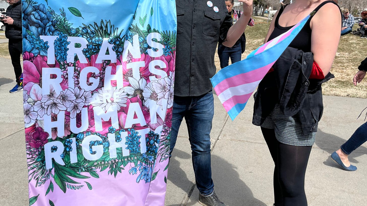 Transgender rights protesters outside the Montana State Capitol on Monday, April 24 2023. (Photo by Blair Miller, Daily Montanan)