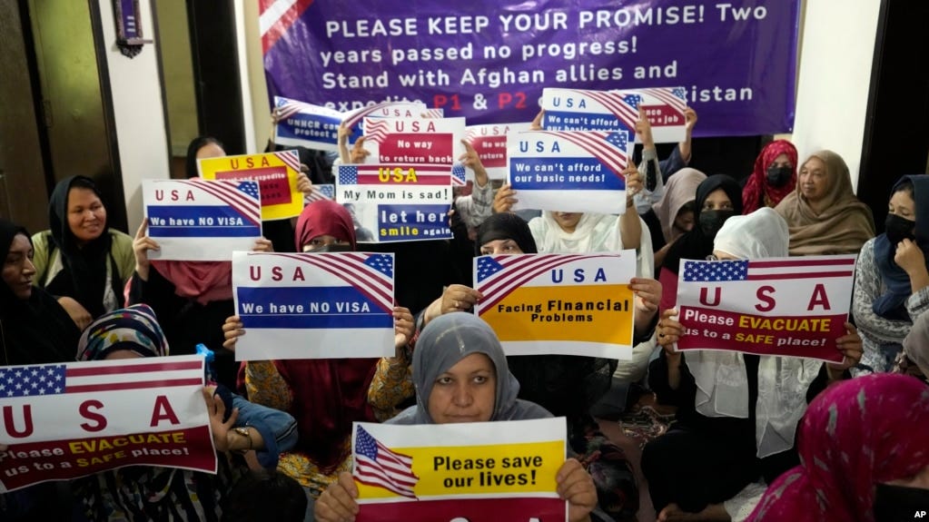 Afghan refugees hold an indoor rally in Islamabad, Pakistan, on July 21, 2023, to demand their U.S. visas be processed. Many Afghans in Pakistan awaiting special immigration to the United States face deportation back to Afghanistan.
