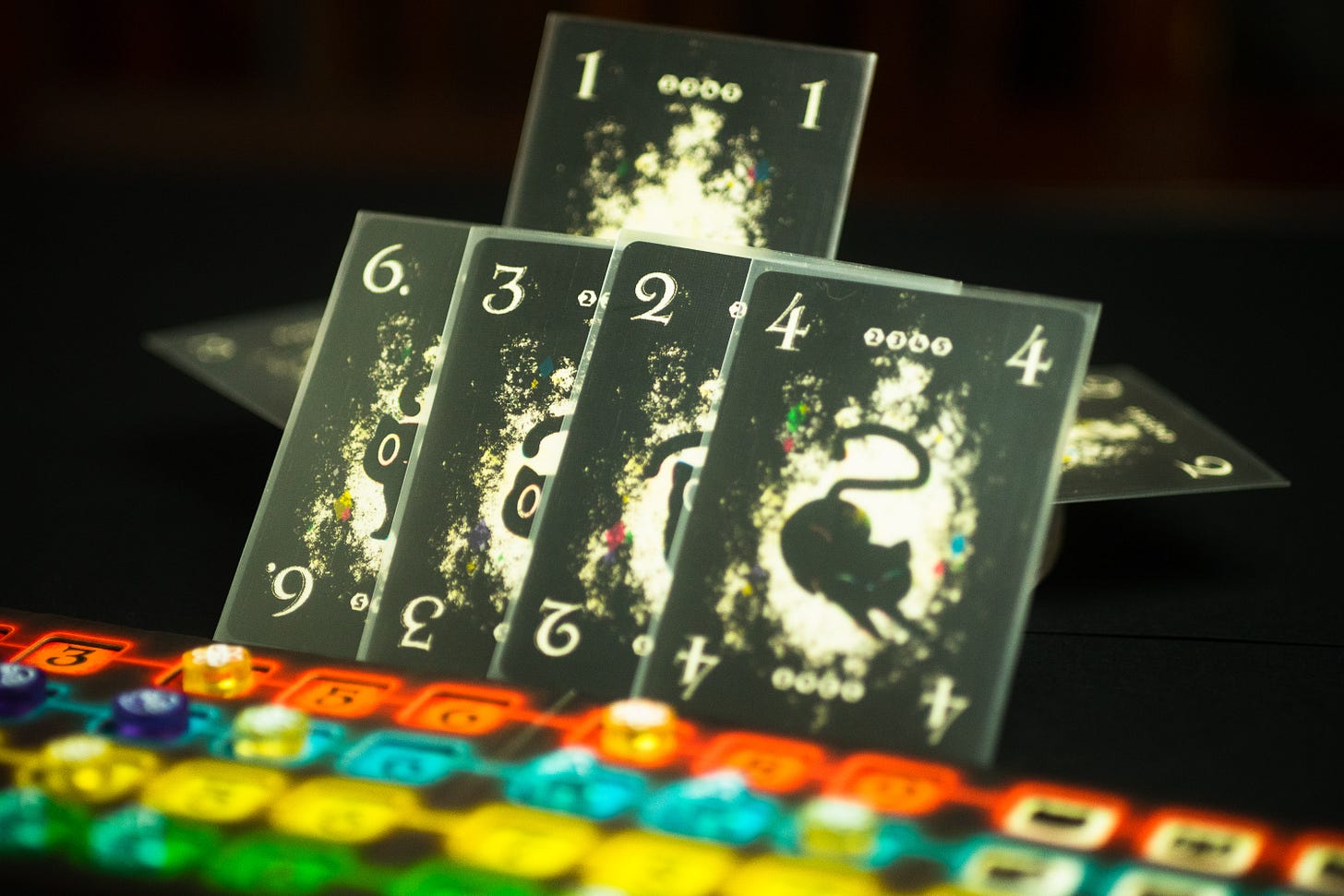 The card game Cat in the Box against a dark background.