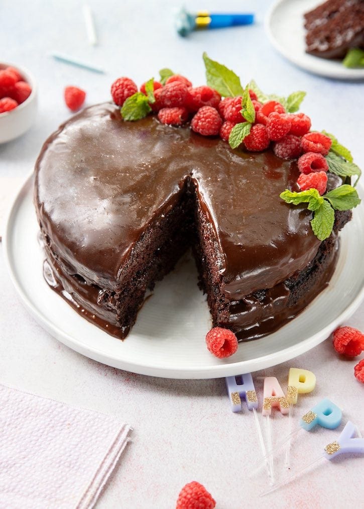 Chocolate vegan birthday cake cut