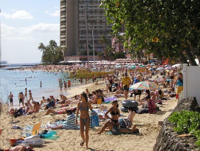 Crowded beaches in Waikiki are important things to consider if you are over 50