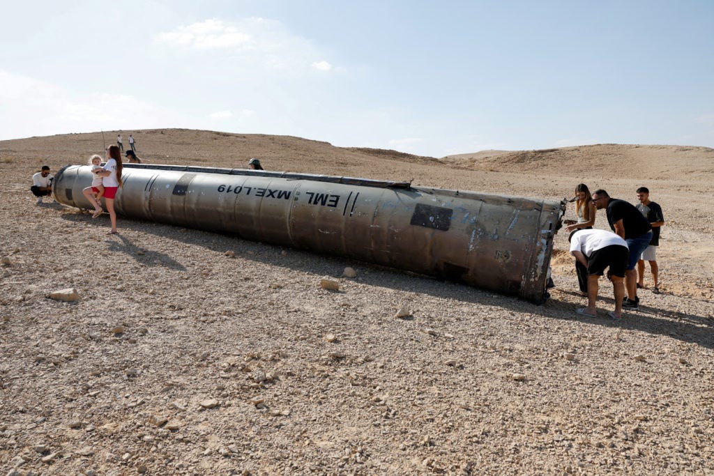 Israel's air-defense system passes test in fending off Iranian missile  strike | PBS News