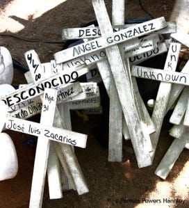 Crosses memorialize migrants who died crossing the Arizona desert in search of work and a new life.