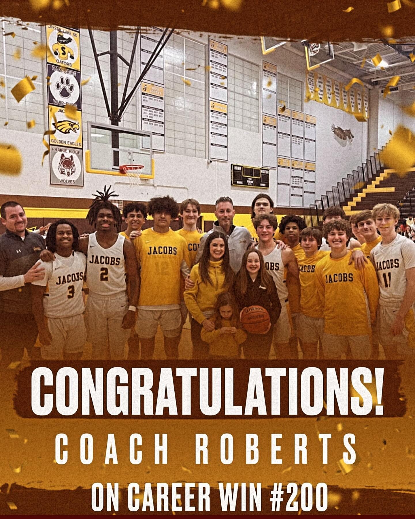 May be an image of 5 people, people playing basketball and text that says '$ GATORS GOLDEN EAGLES PRAIRIE RIOGE WOLVES ES JACOBS JACOBS JACOBS 2 REDE JACOBS JACOBS CONGRATULATIONS! COACH ROBERTS ON CAREER WIN #200'