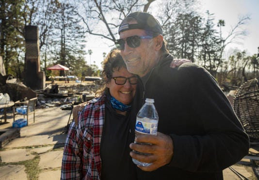 Altadena residents EveAnna Manley, left, and Aaron Lubeley