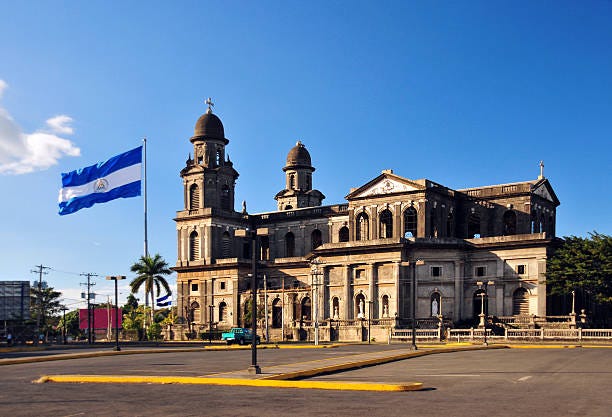 Managua Nicaragua Old Cathedral And Nicaraguan Flag Stock Photo - Download  Image Now - iStock