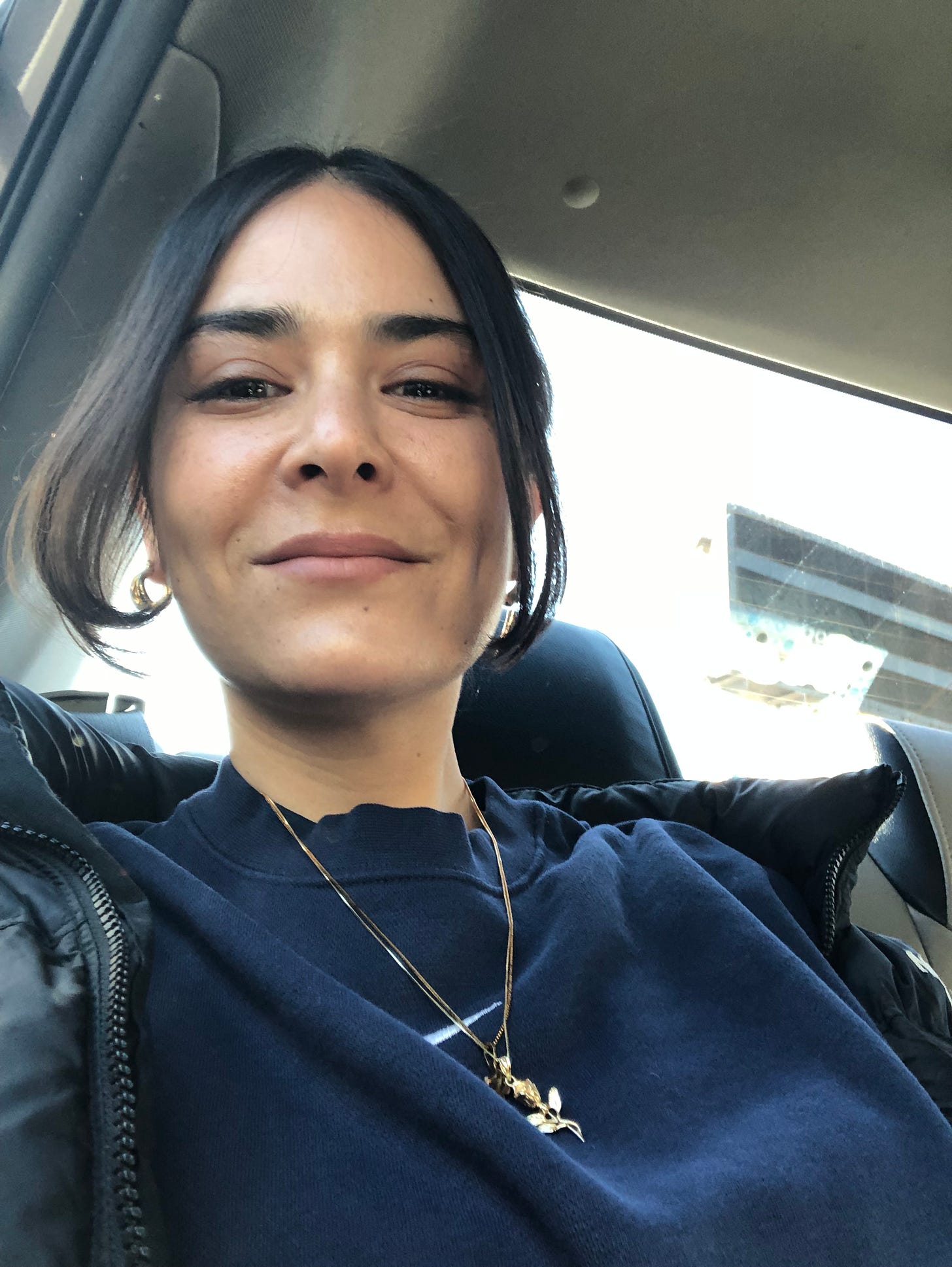 Naomi Zeichner selfie in the backseat of a car
