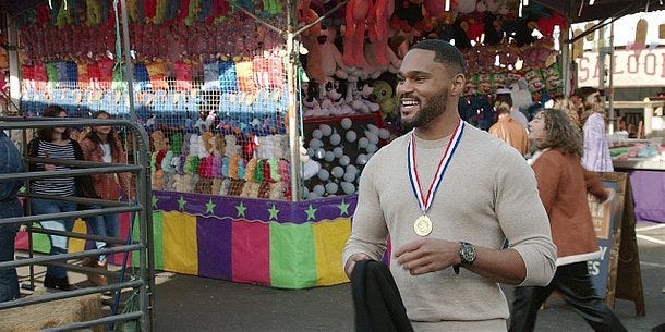 Trey finally smiling at state fair with medal around his neck on Walker 2.14.