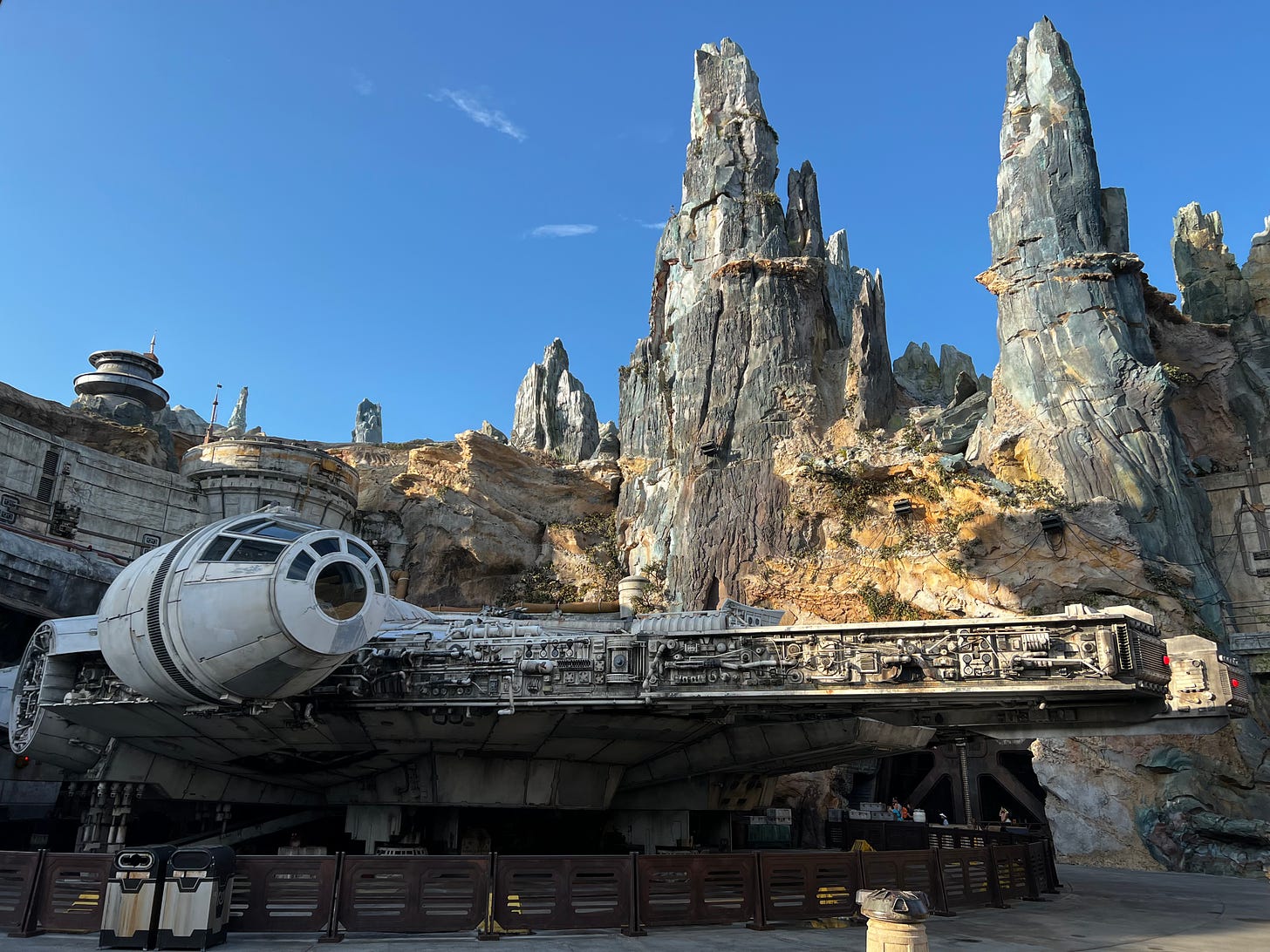 Millennium Falcon spaceship in front of mountains