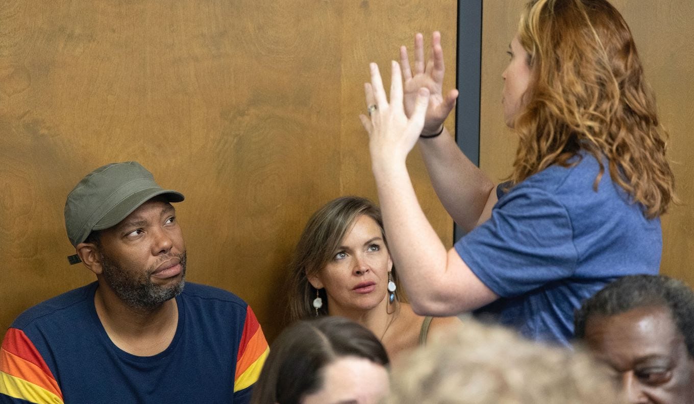 Ta-Nehisi Coates and Mary Wood, an AP English teacher at Chapin High School, speak with supporters before a school board meeting on Monday in Irmo, S.C. (Joshua Boucher/The State via AP)