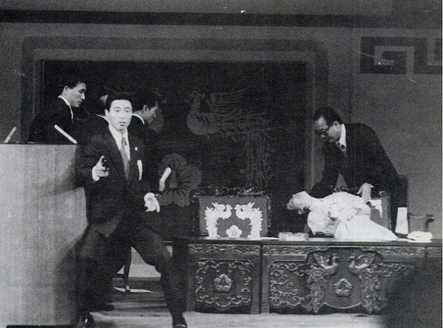 r/HistoryPorn - First Lady of South Korea Yuk Young-soo slumps down after being shot by a North Korean sympathiser, during an assasination attempt on her husband President of South Korea Park Chung-hee, on Korean Independence Day ceremony at the National Theater of Korea in Seoul - 1974 [764x568]