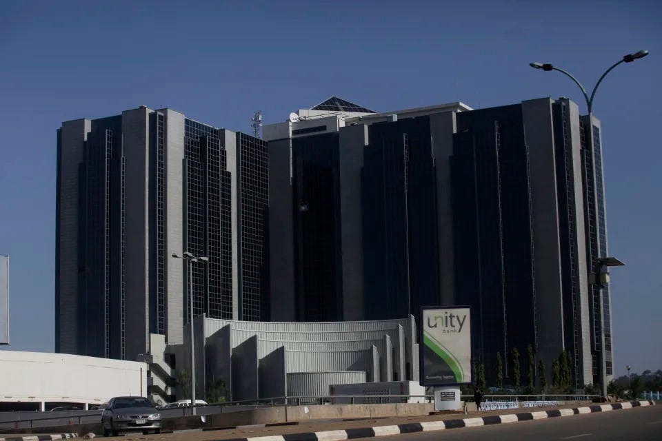 FILE- A general view of a Central bank of Nigeria headquarters in Abuja, Nigeria. Friday, Nov. 11, 2011. Nigeria's central bank has unified all foreign exchange rates, removing a significant distortion in the financial market in the latest move by policymakers in Africa's biggest economy to woo investors and help stabilize the local currency, Angela Sere-Ejembi, director of financial markets at the Central Bank of Nigeria, said on Wednesday, June 14, 2023. (AP Photo/Sunday Alamba, File)