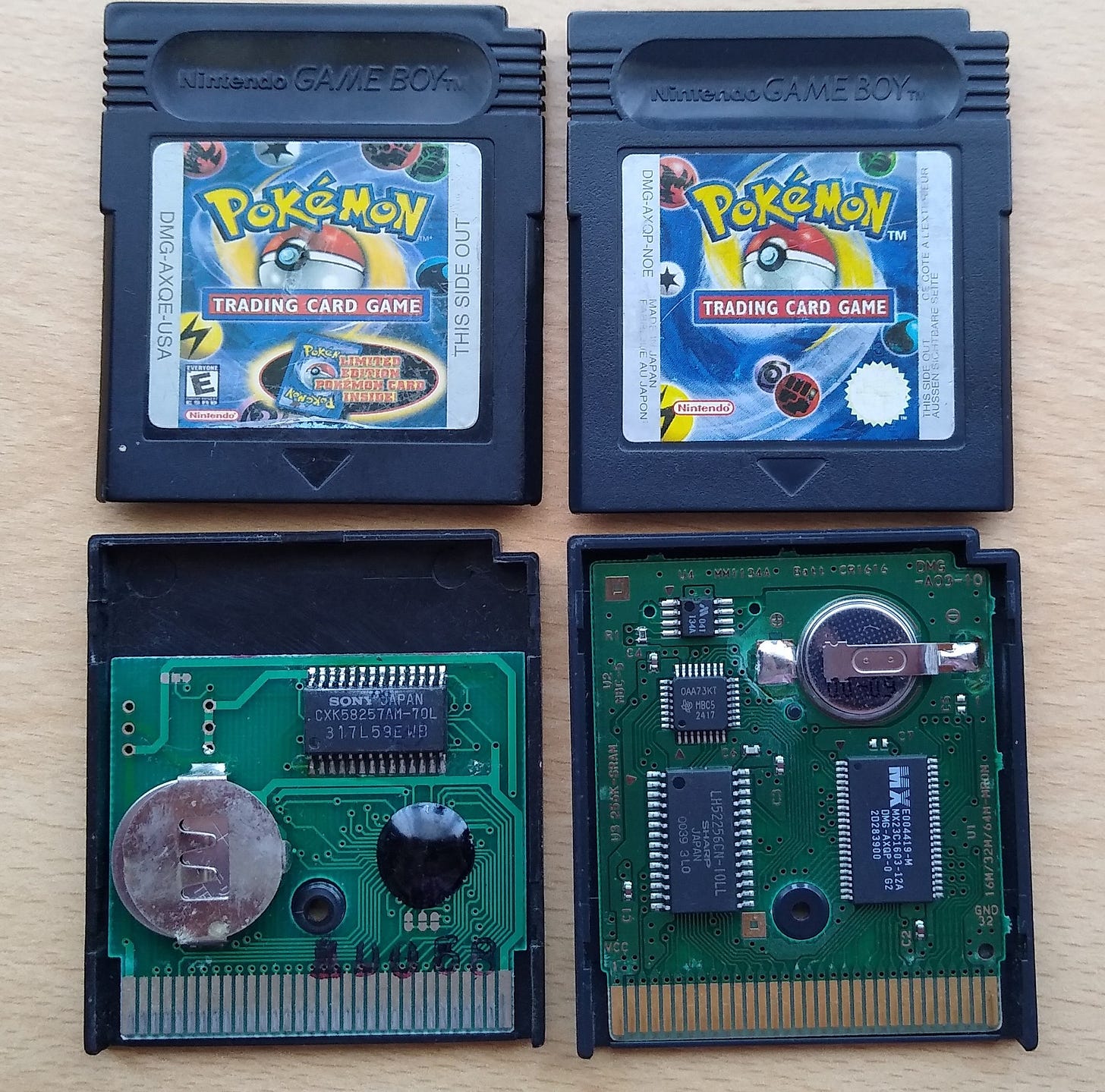 Two copies of Pokémon Trading Card Game for Game Boy. On the left (top and bottom) is the fake, with the easy to spot eproxy blob, and on the right (top and bottom) is the genuine copy, with a much higher quality build (Photo credit: Johto Times)