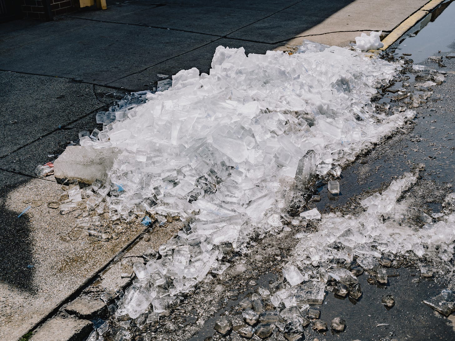 Pile of ice shards on the sidewalk
