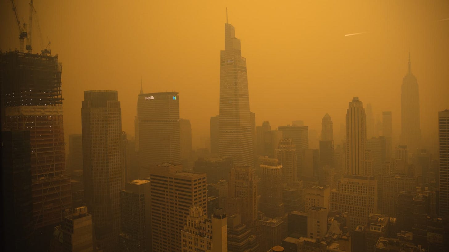 Orange NYC sky thick from Canadian wildfire smoke