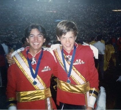 Chris P. Thompson and Lucas Critchfield smile with their medals in front of the full stadium after 1994 finals