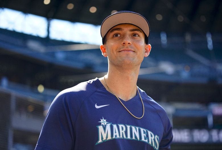 Seattle Mariners&#8217; Dominic Canzone walks out onto the field during batting practice before a baseball game against the Boston Red Sox, Tuesday, in Seattle. (Lindsey Wasson / The Associated Press)