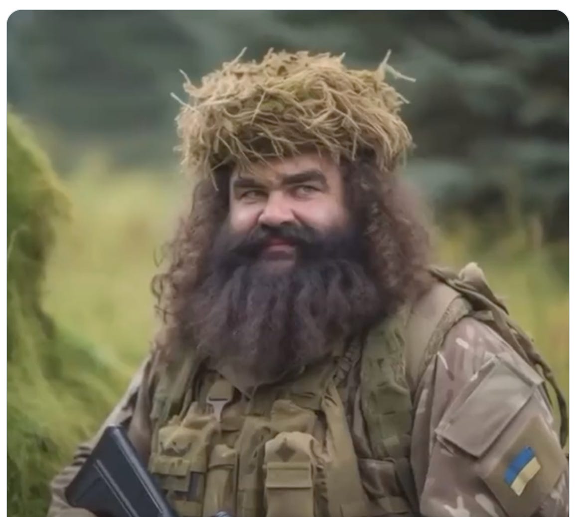 Hagrid in army gear with gun