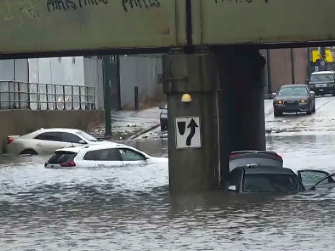 In this image taken from video provided by ABC7 Chicago, several vehicles are stranded in the flooded viaduct at Fifth and Cicero avenues, in Chicago, Sunday, July 2, 2023.