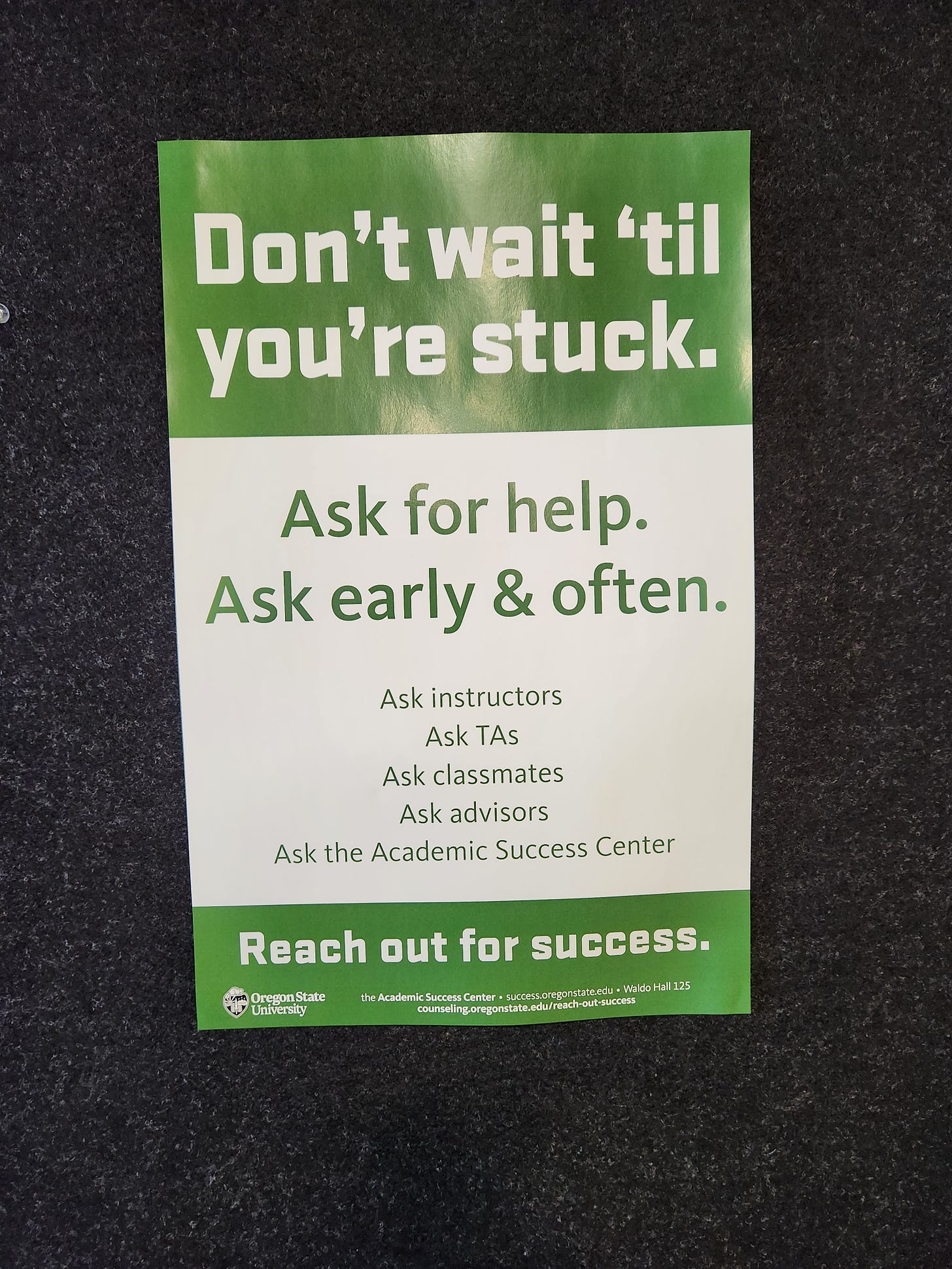 Sign in an Oregon State University classroom that reads: "Don't wait until you're stuck. Ask for help. Ask early and often."