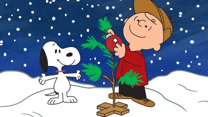 Charlie Brown & Snoopy decorate a Christmas Tree Charlie Brown & Snoopy decorate a Christmas Tree