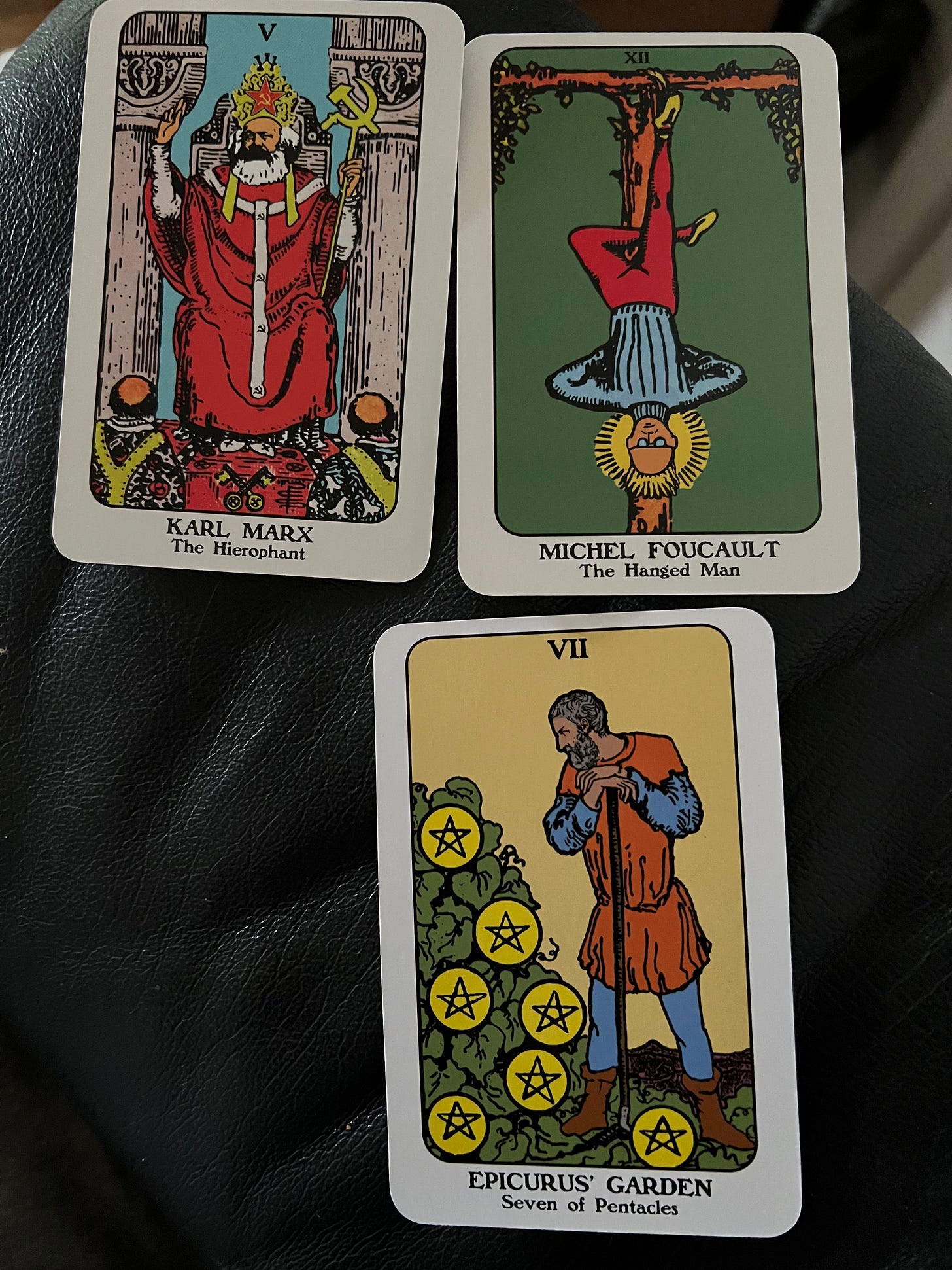 Marx the hierophant, Foucault the hanged man, and Epicurus's Garden, the Seven of Pentacles