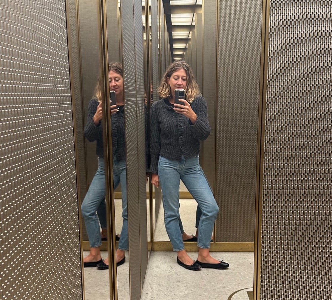 Casey Lewis mirror selfie in elevator
