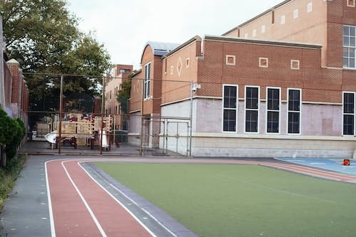 Free Empty sports ground near school Stock Photo