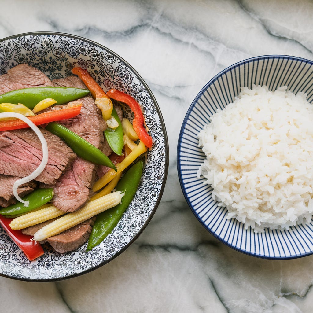 rainbow beef stir fry and a bowl of white rice