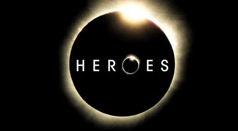 the original Heroes TV show logo, which features the name of the show with a total solar eclipse as the "O", also set in front of a larger total solar eclipse