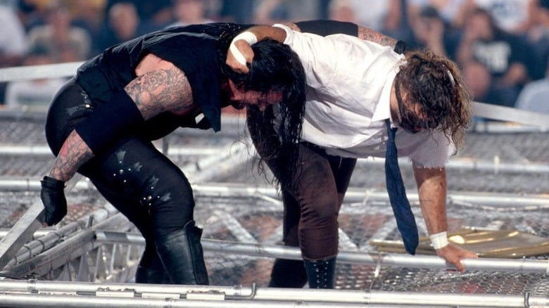 Undertaker and Mick Foley atop Hell in a Cell