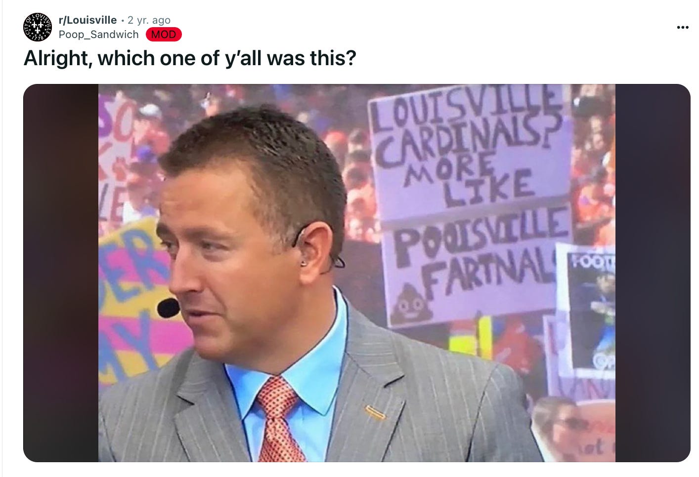 A reddit post by Poop_Sandwich that asks, Alright, which one of y'all was this? with the sign in the background of a TV sportscaster that reads LOUISVILLE CARDINALS? MORE LIKE POOISVILLE FARTNALS
