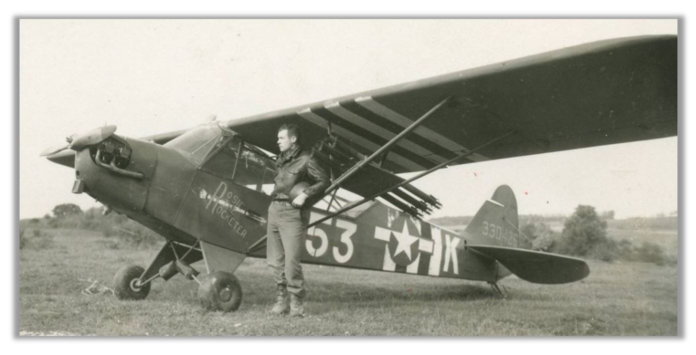 A picture of Charlie with his plane.