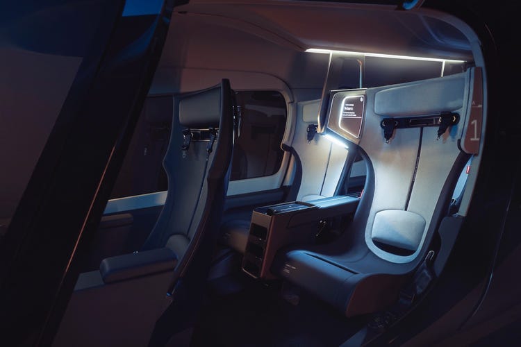 The interior of Archer's Midnight eVTOL with wide seats with headrests.