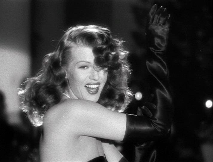 Black and white image of Rita Hayworth as Gilda performing "Put The Blame On Mame."
