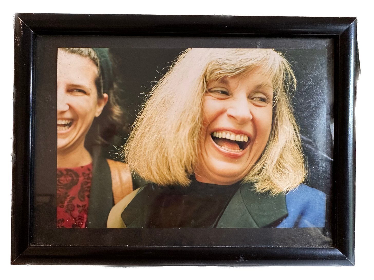 The author and her mother share a full bodied laugh.