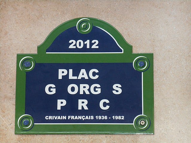 An e-less plaque in homage to the author Georges Perec who wrote a whole novel without the letter e