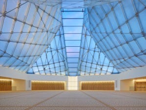 The interior of the prayer hall of the Toronto Ismaili Centre, with the Mihrab and the Qiblah Wall at the front. The interior of the prayer hall of the Toronto Ismaili Centre, with the Mihrab and the Qiblah Wall at the front.