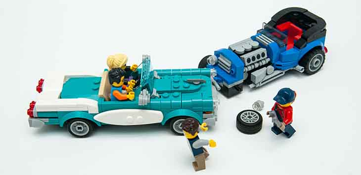 Photo of two Lego cars that have crashed.