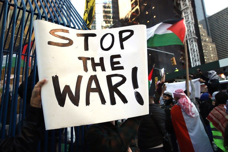 Hundreds of people rallied in Times Square in support of Palestinians under siege by the Israeli army in Gaza.