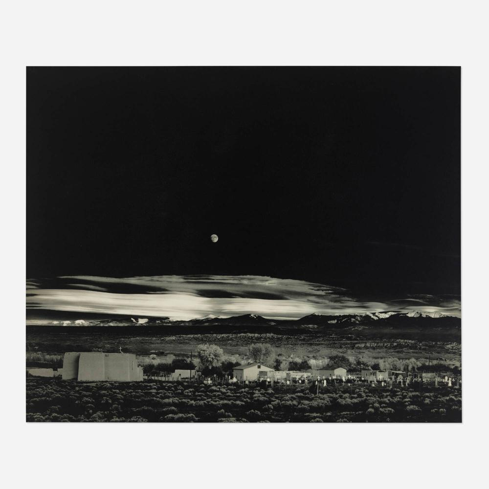 Ansel Adams' iconic black and white photograph "Moonrise, Hernandez, New Mexico" (1941) captures a stunning twilight landscape. The foreground features a cemetery with illuminated white gravestones, while the midground depicts the small town of Hernandez as a collection of geometric shapes and varied shades of gray. The background showcases the dramatic Sangre de Cristo Mountains, their jagged peaks forming a striking horizon line. The moon, a bright and sharply defined disk in the upper right, draws the viewer's eye and balances the composition. Adams' signature style shines through the meticulous composition, wide tonal range, and sharp clarity. The interplay of light and shadow, the juxtaposition of natural and man-made elements, and the sense of timelessness contribute to the photograph's enduring appeal and status as a iconic image in photographic history.