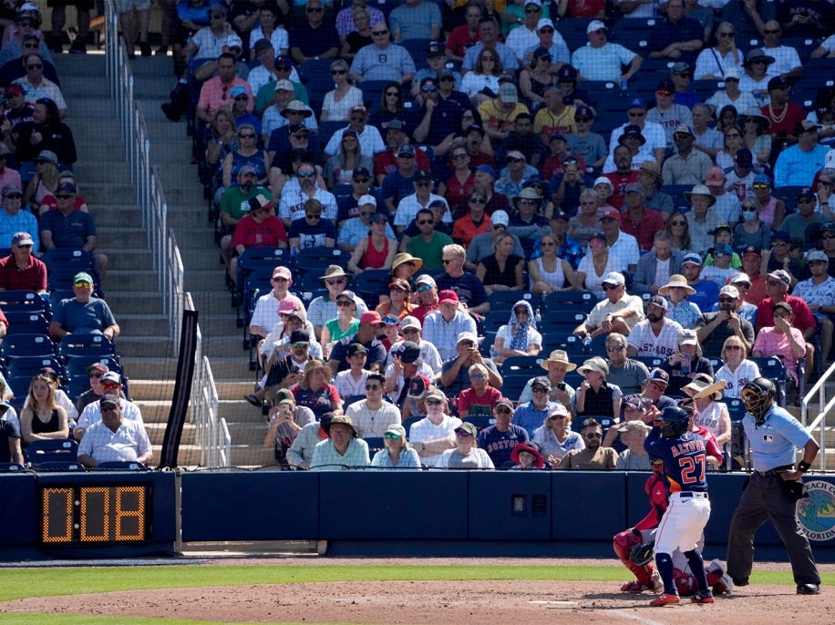Houston Astros' Jose Altuve bats as the pitch clock ticks down