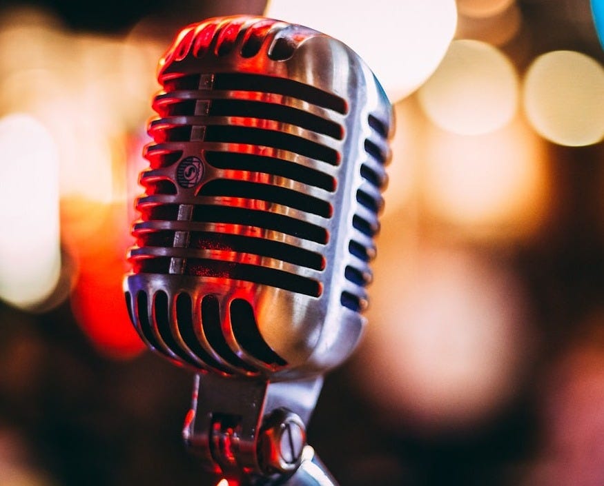 bokeh photography of condenser microphone bokeh photography of condenser microphone