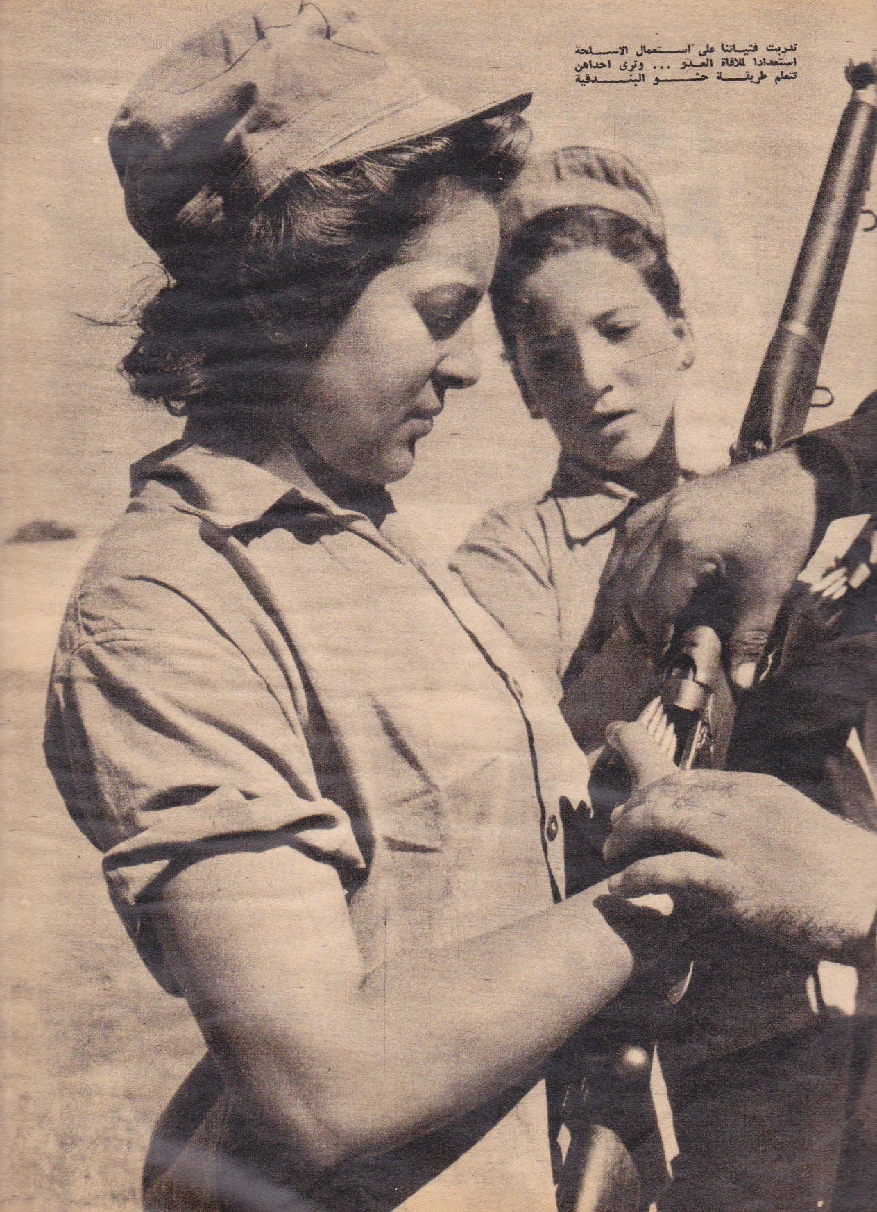 Egyptian women bear arms to resist Israeli, British and French invasion of Port Said 1956
