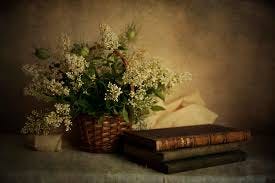 old books and white flowers ...