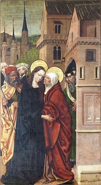 The Visitation with bystanders and late-medieval buildings in the background.
