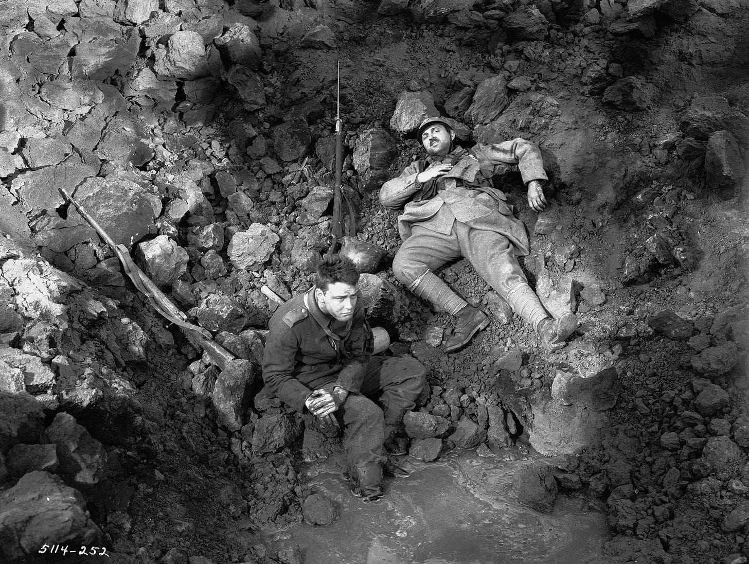 Lew Ayres and Raymond Griffith in a scene from All Quiet on the Western Front